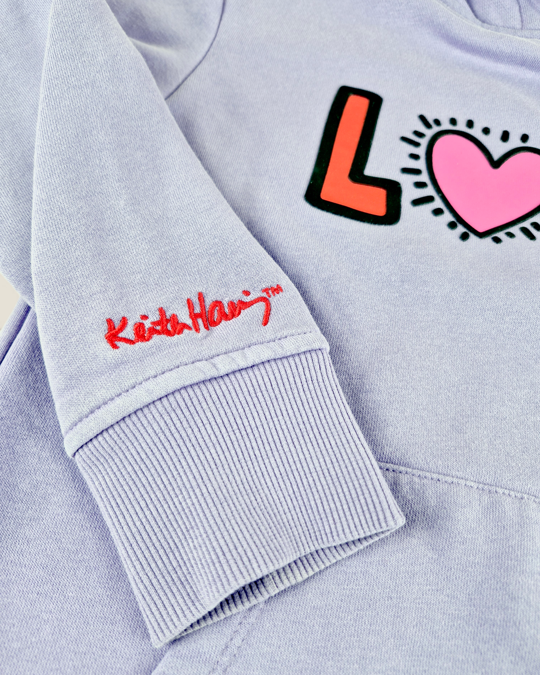 Pre-Loved Keith Haring Purple "Love" Hoodie Girls 7-8Y | Betty’s Marketplace